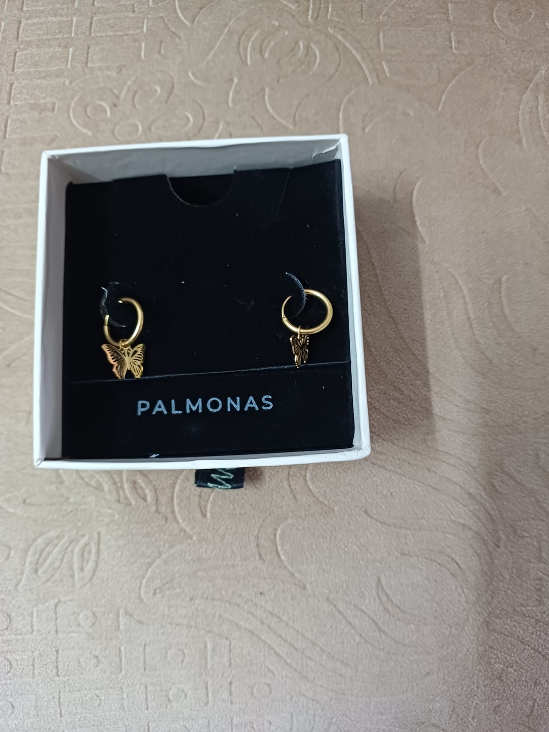 Customer photo review of Sylvia Butterfly Hoop Earrings
