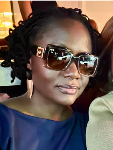Customer photo review of Liora Dangle Earrings - Gold