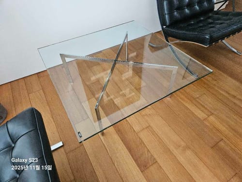 Customer photo of the installed Barcelona square glass and steel coffee table.