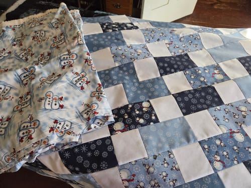 Customer photo review of Brick Snowman Precut Quilt Kit (Backing Available)
