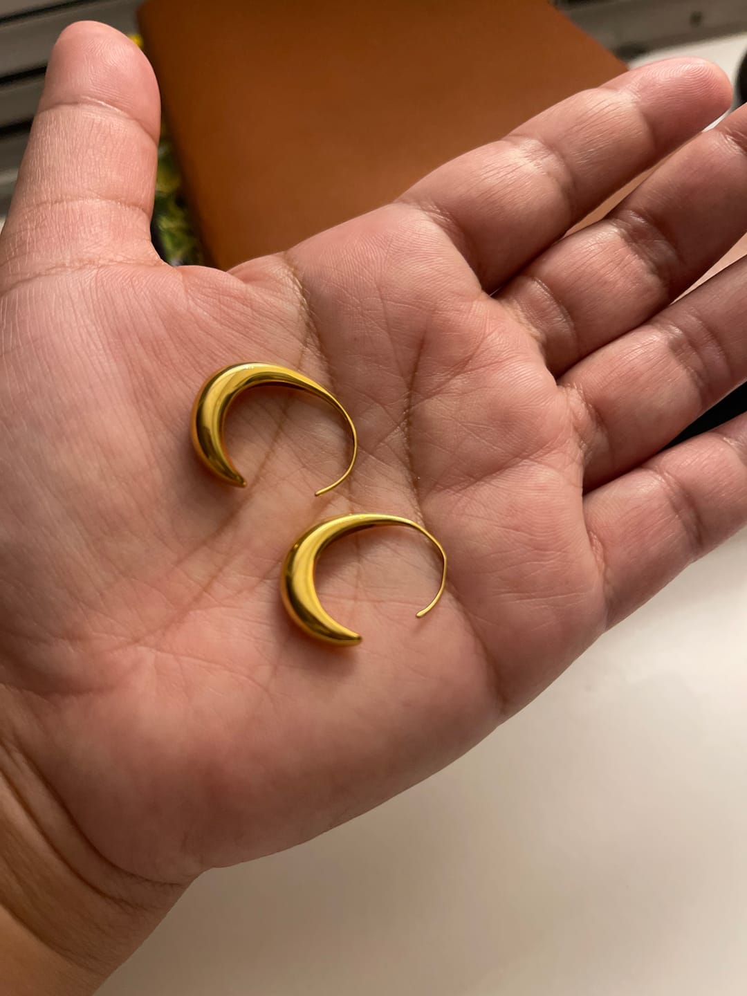 Customer photo review of Classic Drop Hoop Earrings