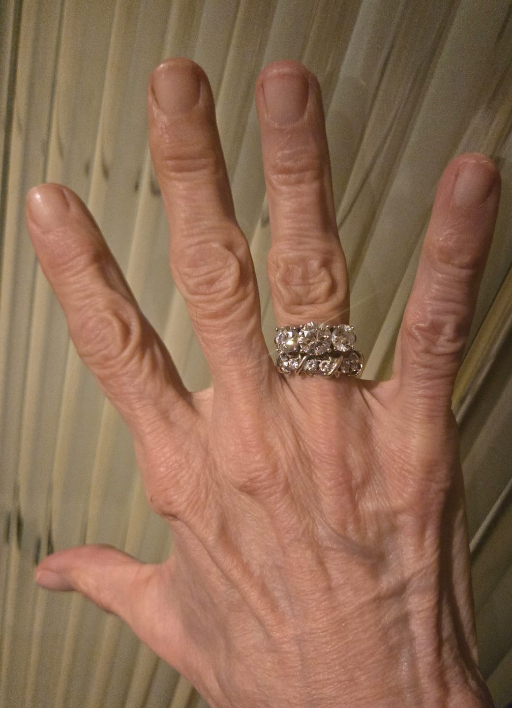 Customer photo review of Classic Three Stone Round Cut Moissanite Engagement Ring
