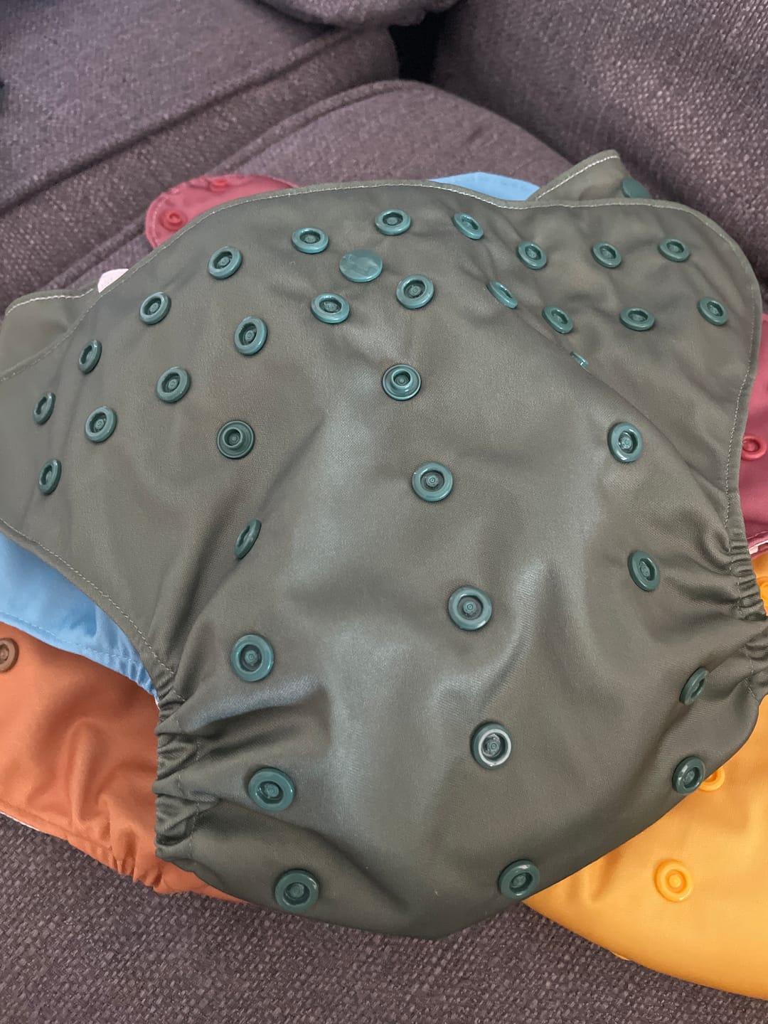 Customer photo review of Solid Color: Essentials Pocket Cloth Diaper with Athletic Wicking Jersey, Grows with your Baby