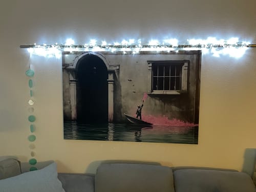 Customer photo review of Leinwandbild Banksy Junge auf dem Boot Querformat
