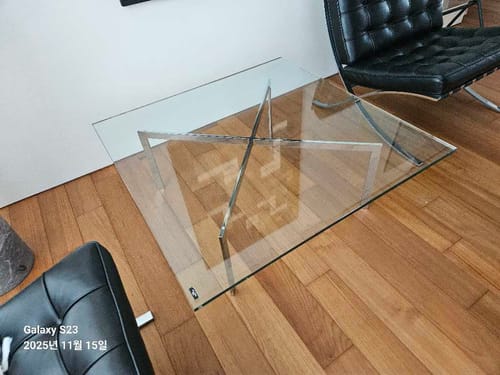 Customer photo showing the chrome frame and glass top after installation.