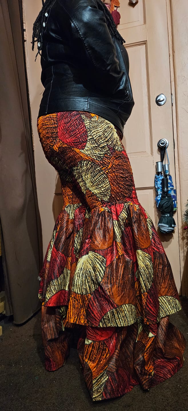 Customer photo review of Kimi Women's African Print Bell Bottom Pants - Red/Brown