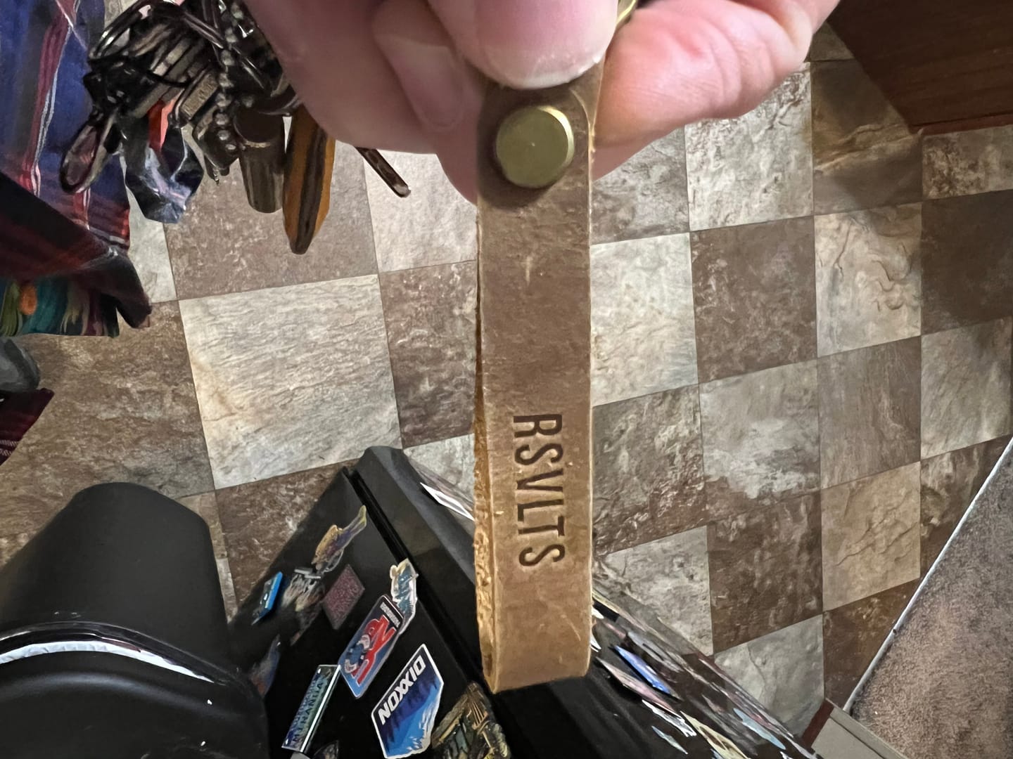 Customer photo review of Dare Mighty – Leather Keychain
