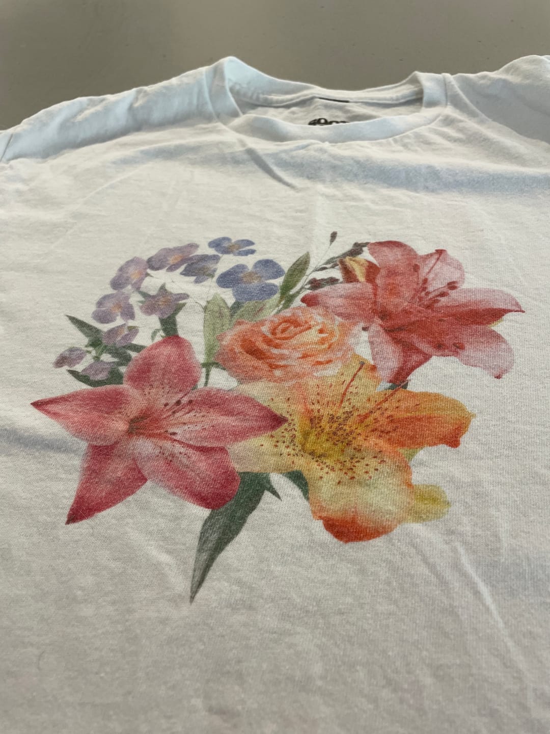 Customer photo review of Scrapbook Flowers Baby Tee
