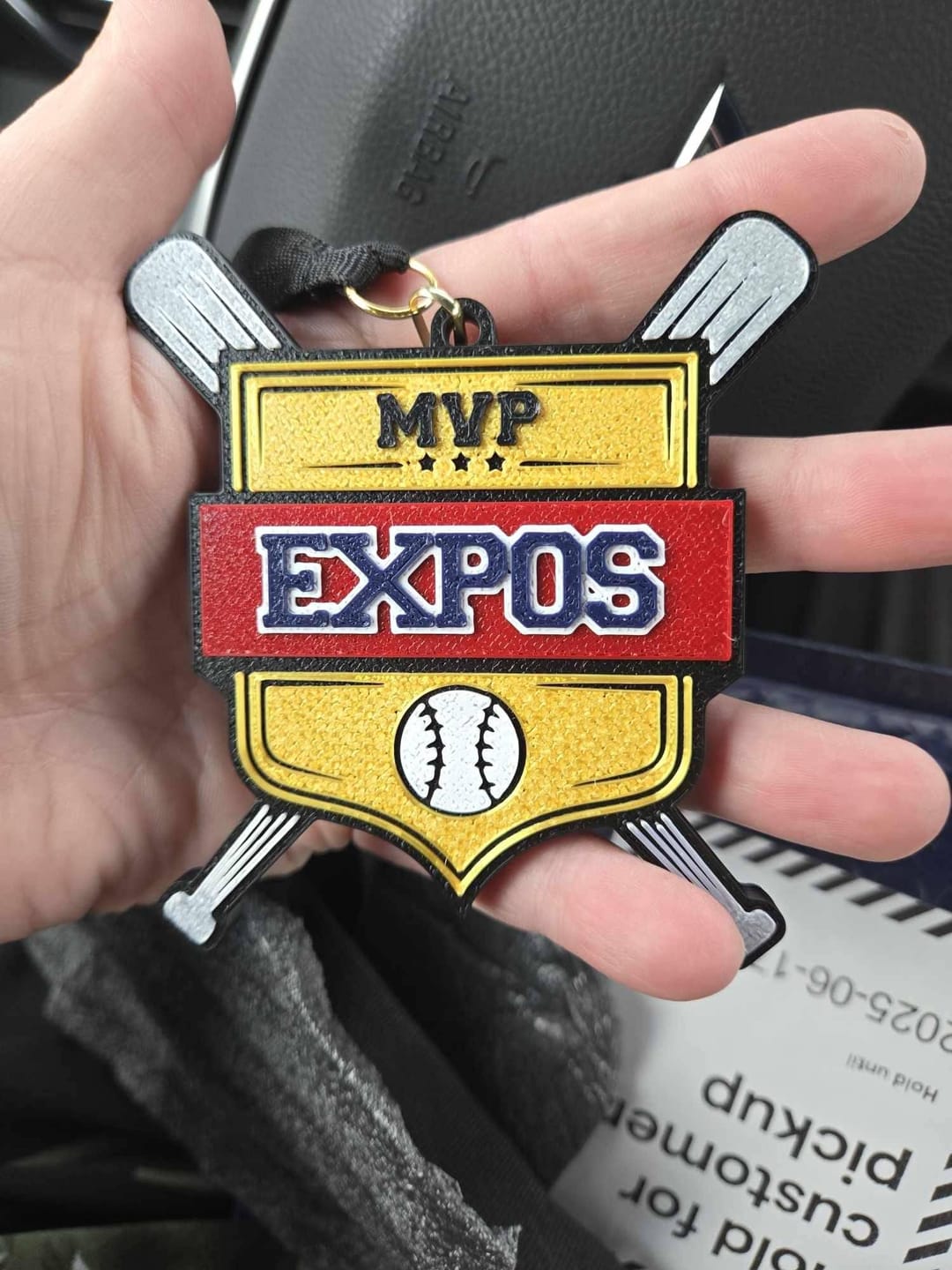 Customer photo review of Personalized Baseball Medal – The Perfect Gift for Your Team