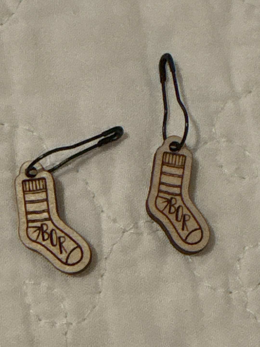 Customer photo review of Set of 2 Laser Engraved Removable Sock Stitch Markers - BOR