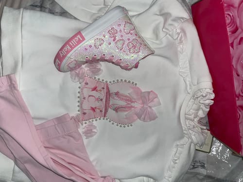Georgia H. review of Girls Pink Cotton Leggings Set with Frills, Bows & Snow Globe image 1 out of 1