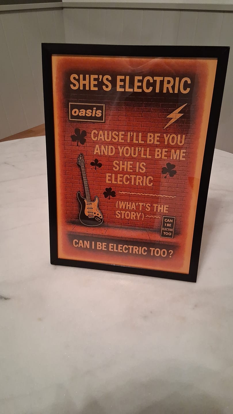 Customer photo review of She's Electric - Oasis Inspired Graffiti Poster