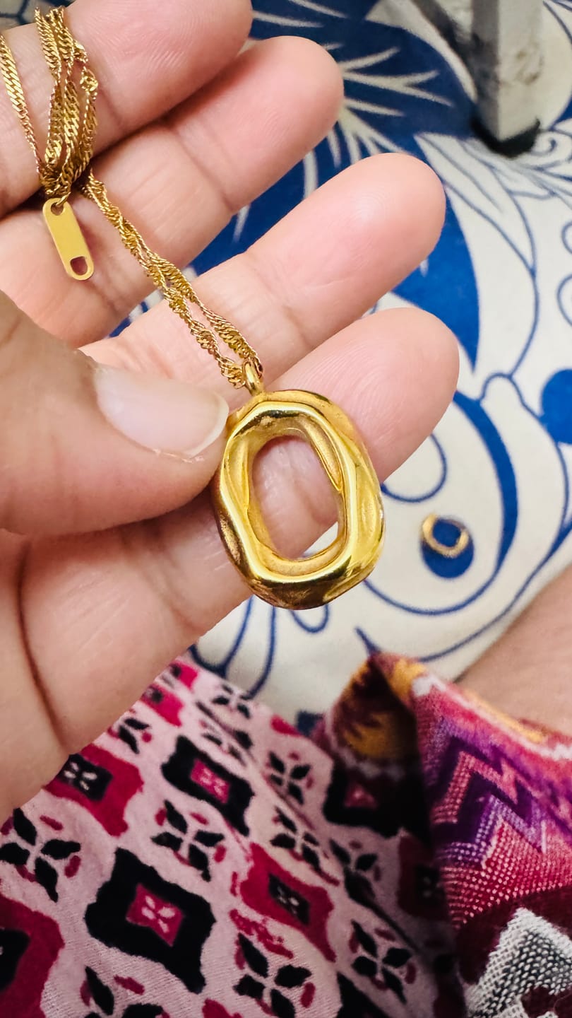 Customer photo review of Twin Glow Heart Necklace