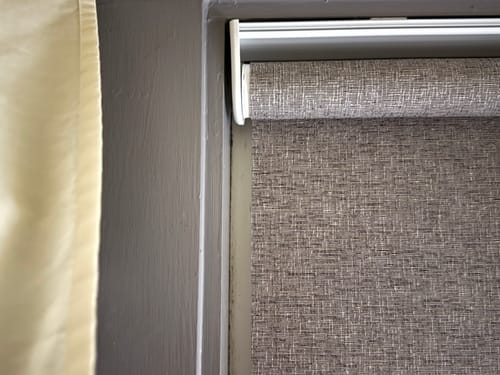 Customer photo review of SmartWings Motorized Light Filtering Roller Shades 70% Blackout Safari