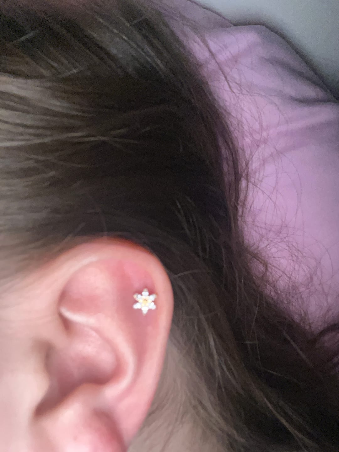 Customer photo review of Blossom Piercing | Titan