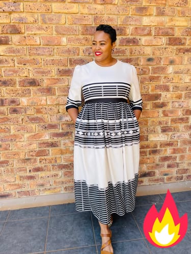 Mpolokeng M. review of Three Quarter Sleeve Xhosa Round Neck Ankara Dress. image 1 out of 1
