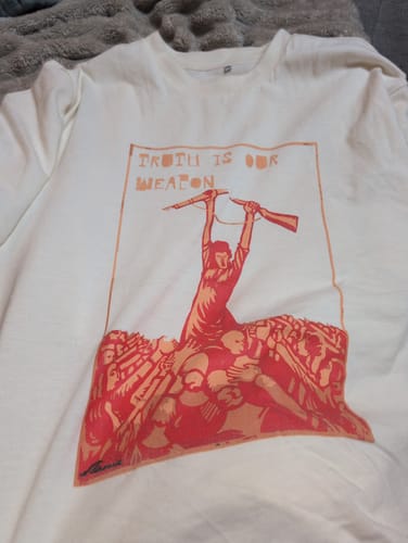 Customer photo review of "Truth is our weapon" Oversized Shirt