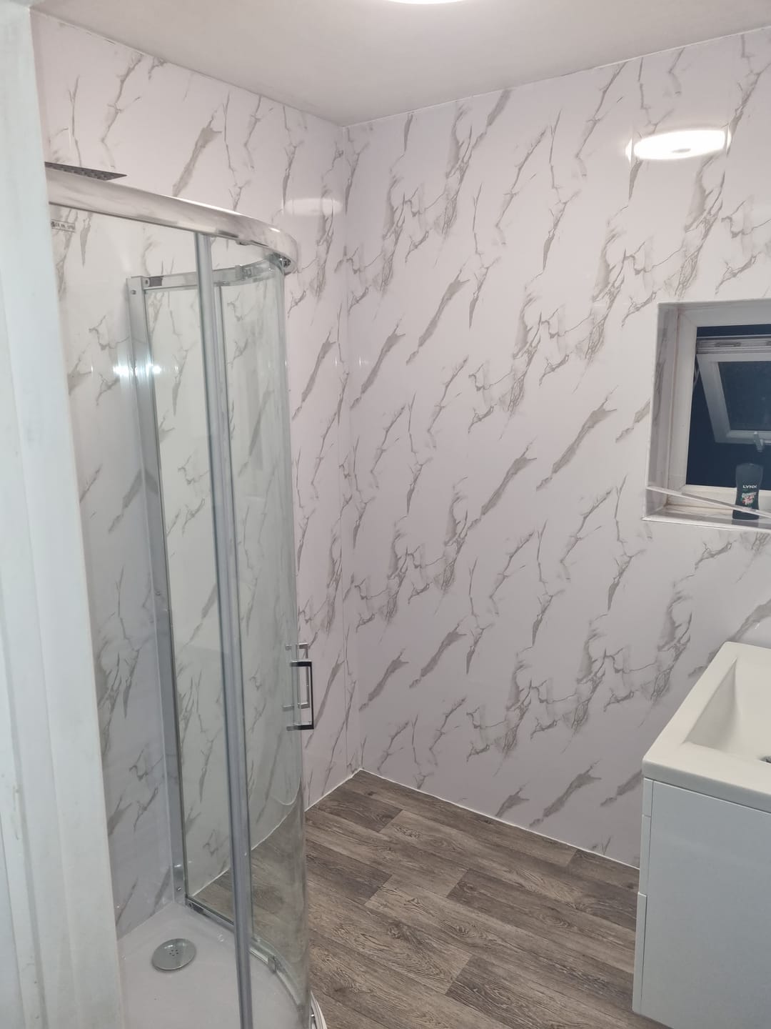 Customer photo review of 4 Pack | 8mm Carrara White Marble Gloss Wall & Ceiling Panel 2.6m