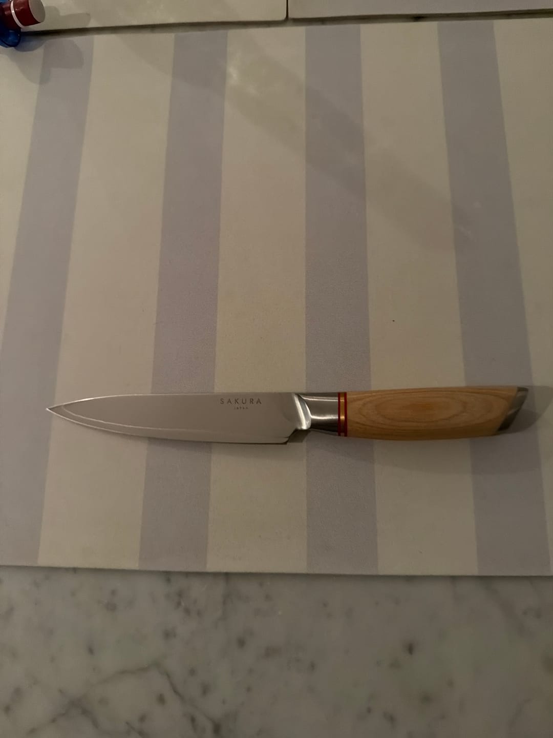 Customer photo review of Cuchillo Utility Sendai Sakura Light Pakkawood 23 Cm