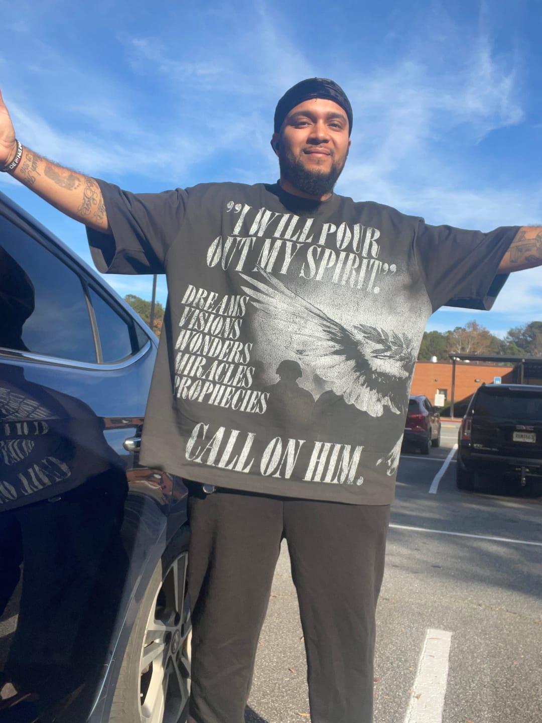 Customer photo review of [PRE-ORDER - SHIPS NOVEMBER 10TH] Holy Spirit [Dove] Wrap-Around Graphic Tee (Oversized Fit)