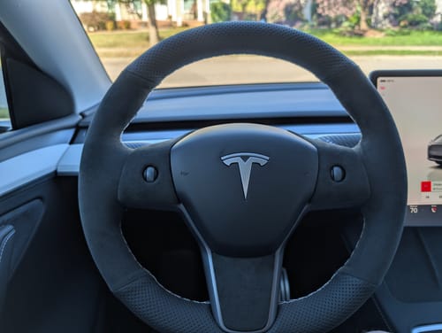Customer photo review of Alcantara Steering Wheel Overlay Covers For Tesla Model Y 2020-2025