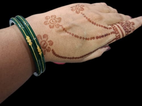 Customer photo review of “Hallmark Green Divya Shringar Bangle” (Pack of 1 Pair) (2 pis)