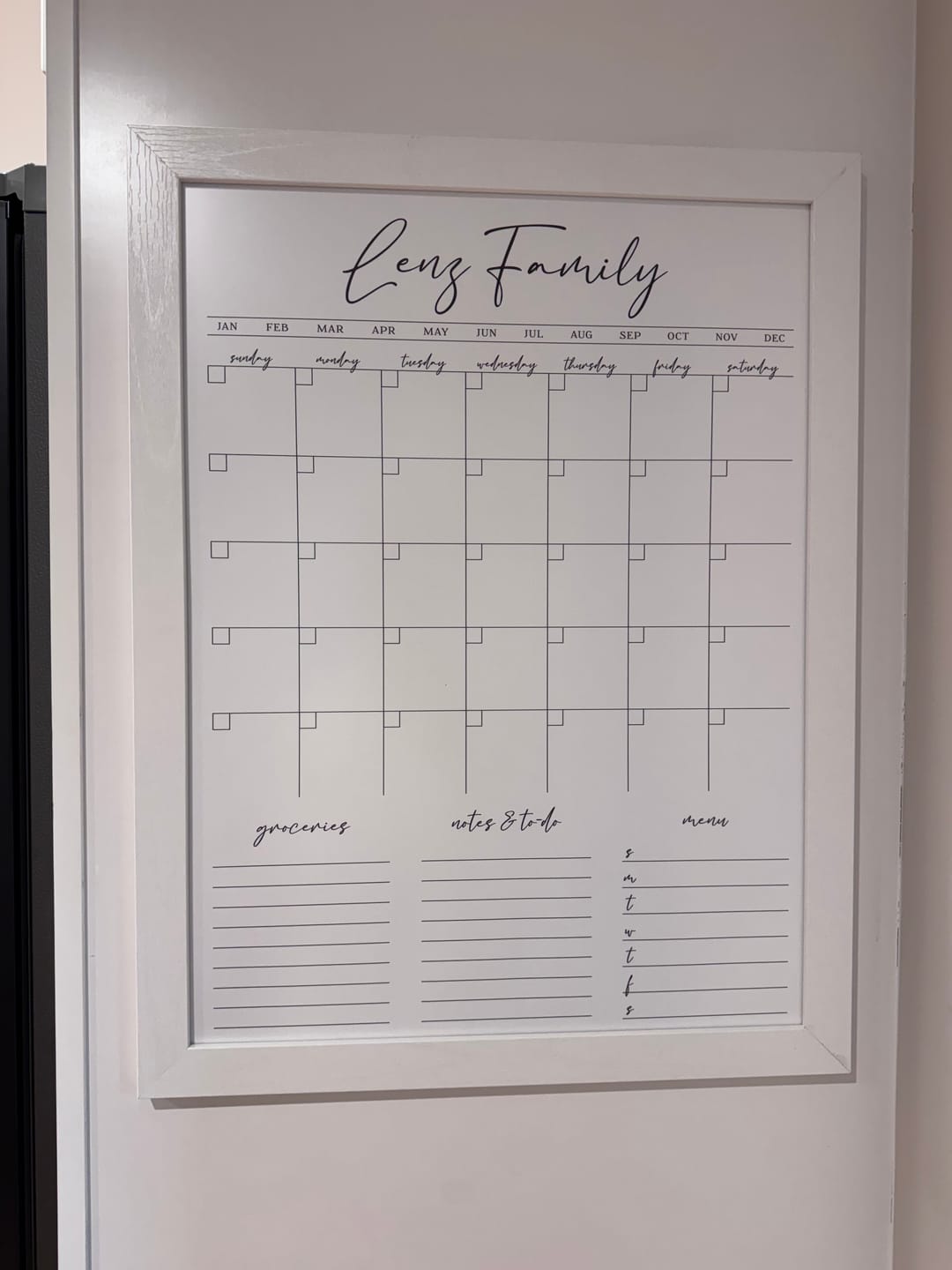 Customer photo review of Monthly Framed Whiteboard Calendar + 3 sections | Vertical Pennington
