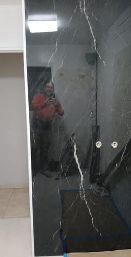 Customer photo review of Panneau Mural PVC Marbre Noir Brillant – Imperméable Douche & Salle De Bain