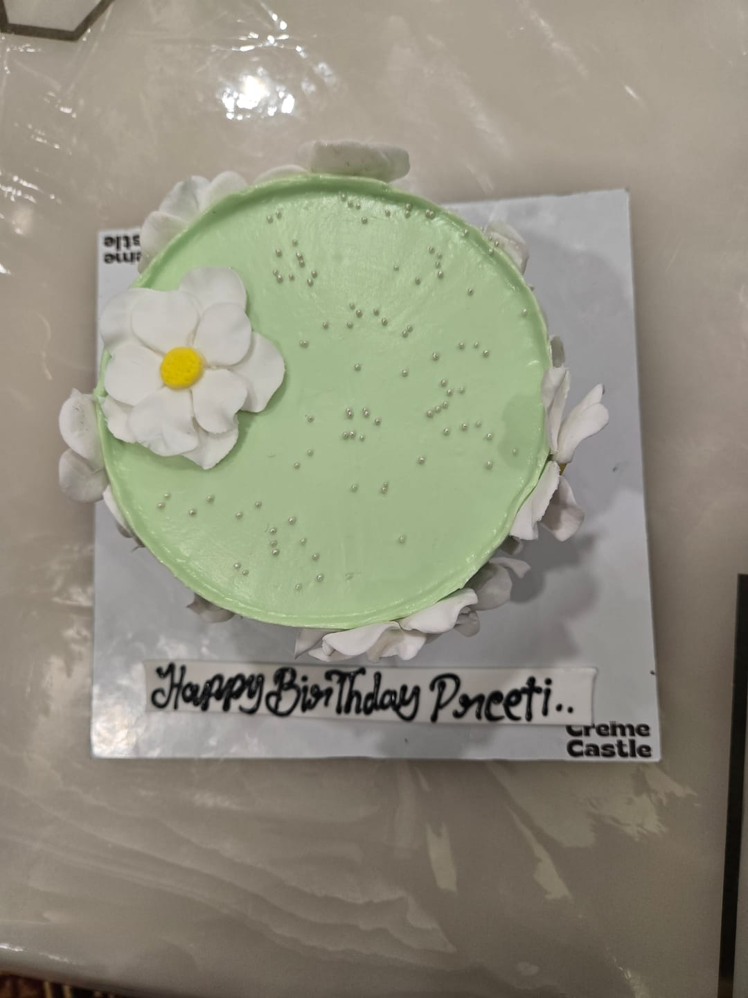 Customer photo review of White Petal Bloom Cake