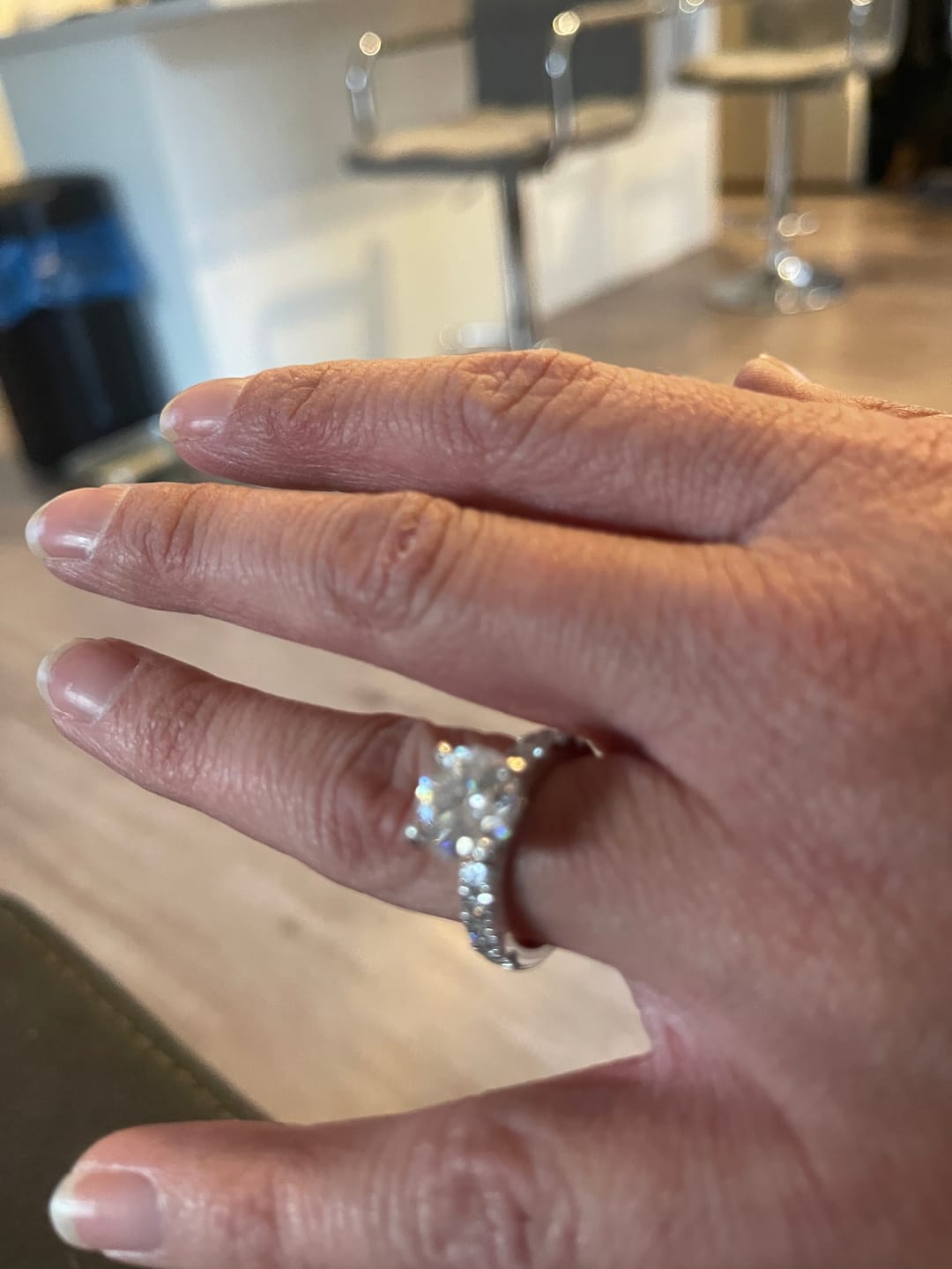 Customer photo review of Luxury 4.3 Carat Round-Cut Solitaire Ring with Accent Stones