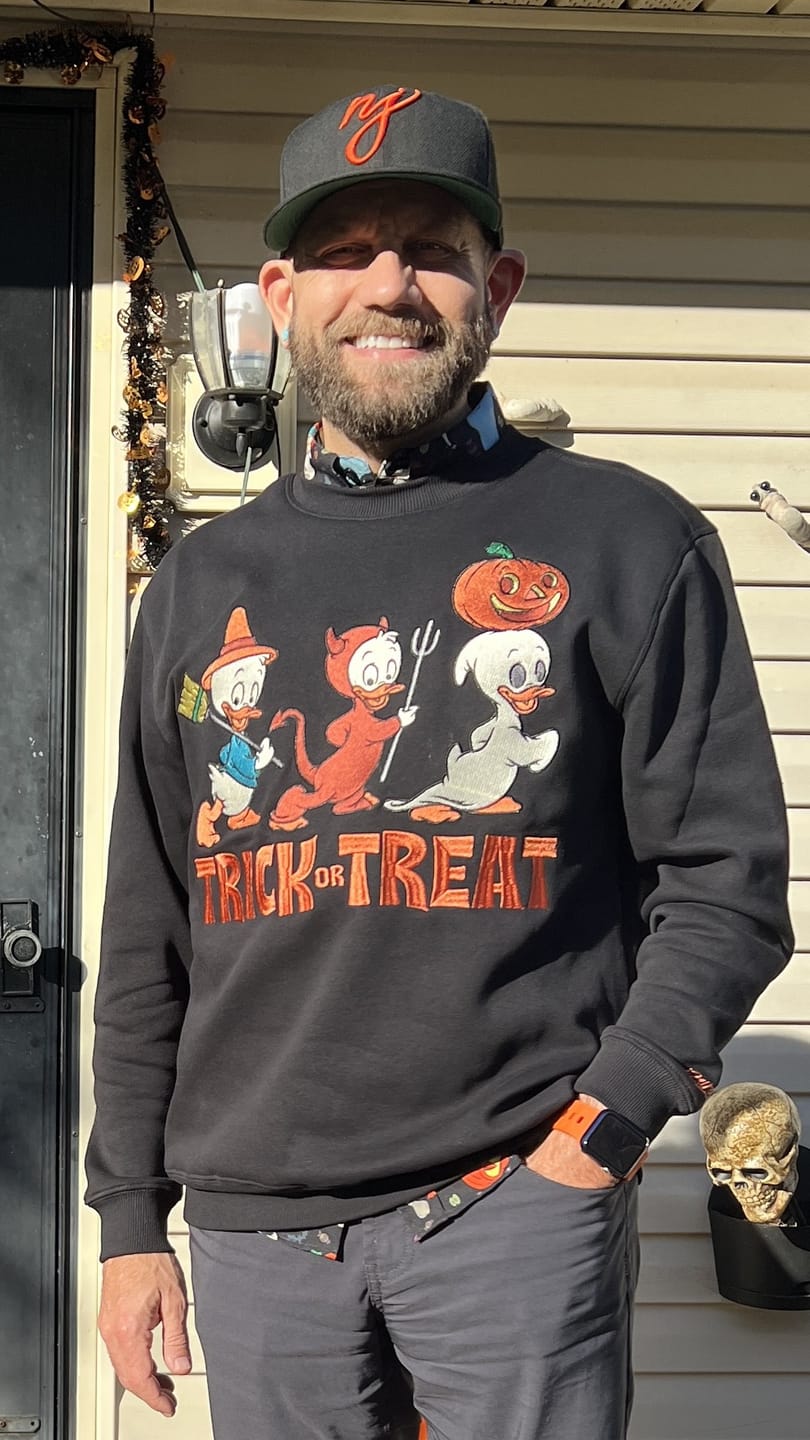 Customer photo review of Disney "Tricks, Treats, and Trouble" – Crewneck Sweatshirt