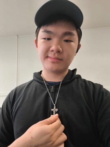 Customer photo review of FREE Today: Lord's Prayer with Interlocking Ring Cross Pendant Necklace: Bold Style Sacred Meaning