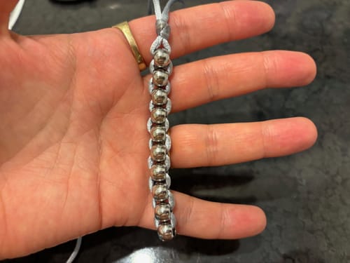 Customer photo review of NECKLACE Unisex Caterpillar by Kaiko