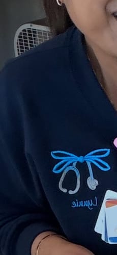 Customer photo review of Personalized Crew Neck Sweatshirt | Bow Embroidery