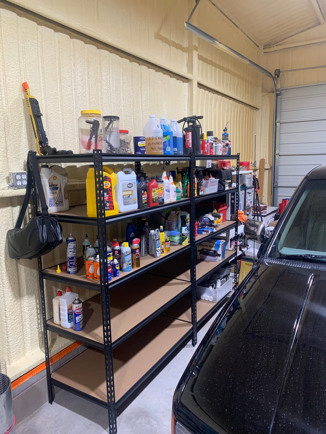 Customer photo review of Reibii 48.2" W x 24" D Heavy Duty Garage Shelving Units Load 3000LBS, Adjustable Steel Shelves for Garage Basement Warehouse