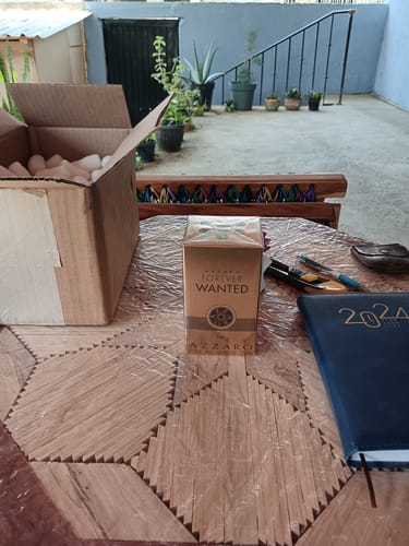 Reseña con foto de un cliente sobre Perfume Azzaro Forever Wanted Elixir Parfum
