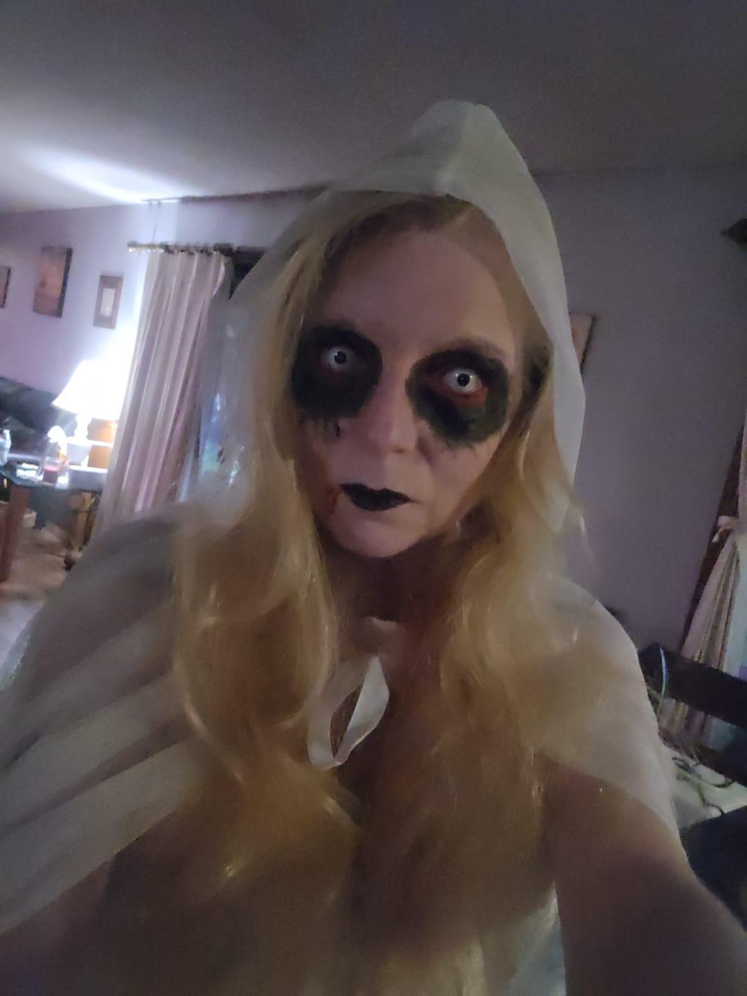 Customer photo review of Halloween Whiteout Prescription Colored Contact Lenses
