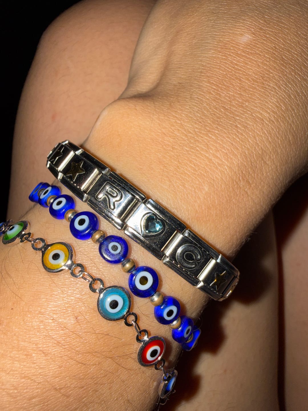 Customer photo review of Charm Inicial Plateada