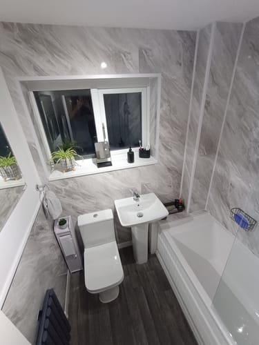 Customer photo review of Premium Grey Stone Marble Gloss Shower Wall Panel - 1M x 2.4M