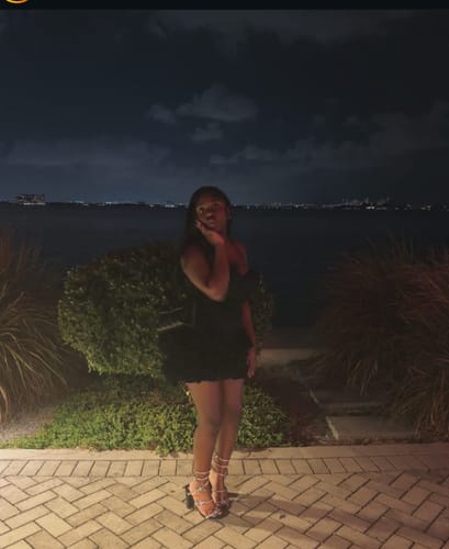 Customer photo review of Neveah Mini Dress