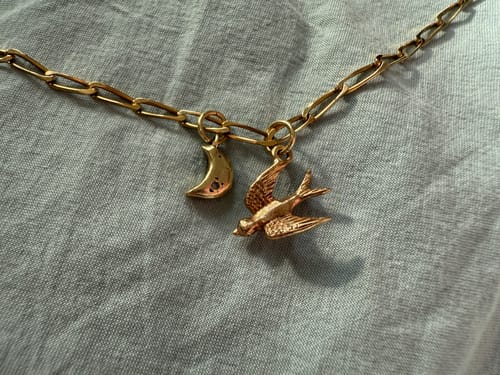 Customer photo review of The Graceful Golden Swallow Bird Charm (9ct 375 Gold 1972)