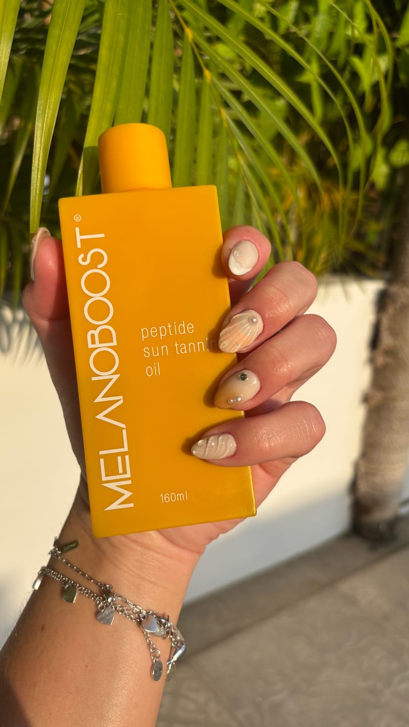 Customer photo review of Tan Boosting Duo - Sun Tanning Oil + Lotion