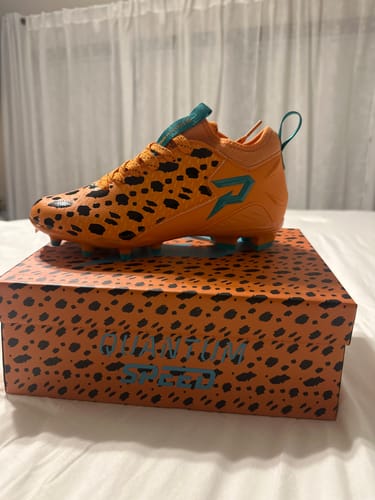 Customer photo review of The Flintstones "Bedrock Blitz" Football Cleats - Quantum Speed by Phenom Elite