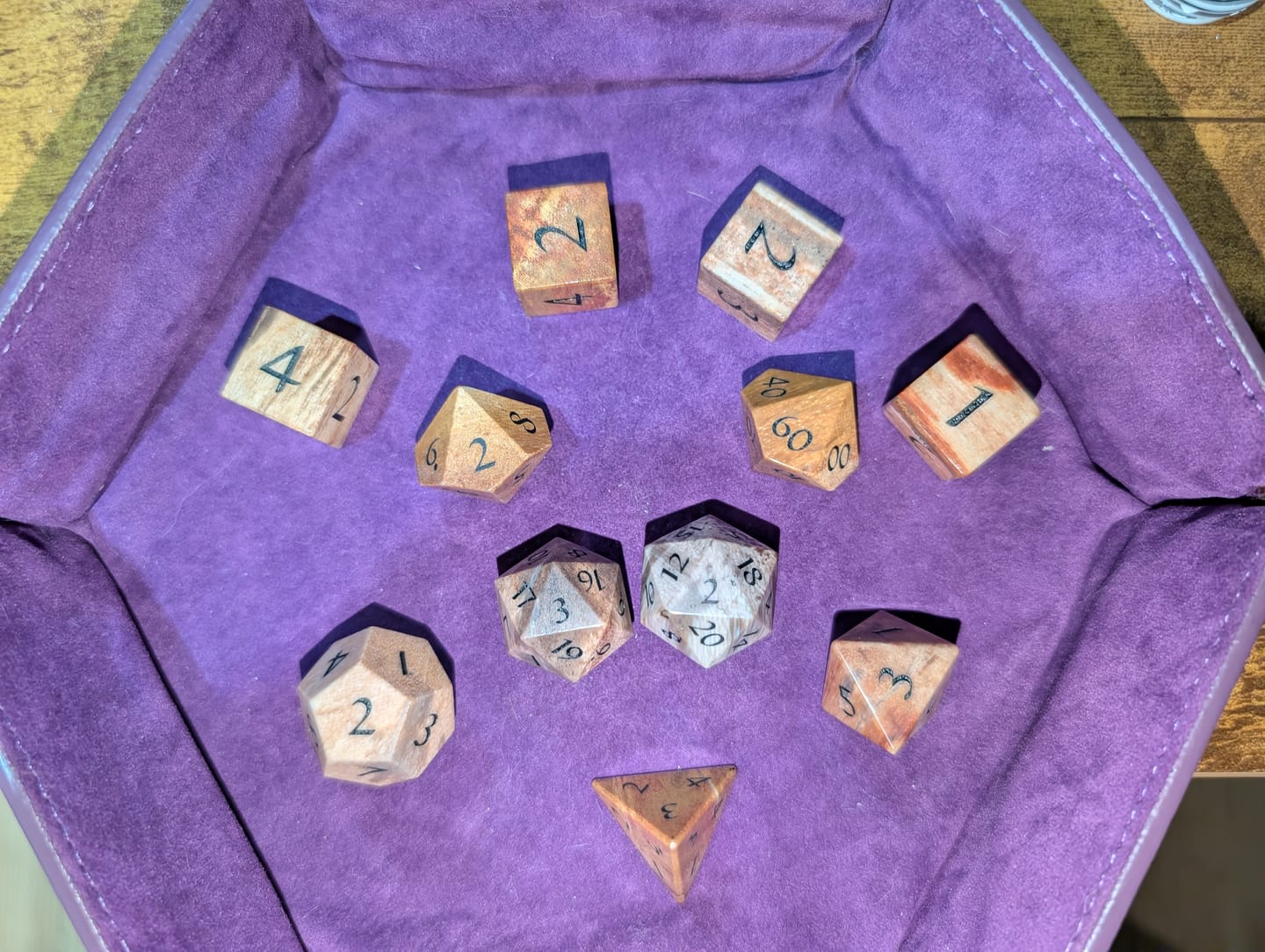 Customer photo review of URWizards D&D Petrified Wood Gemstone Engraved Dice Set(Limited edition)