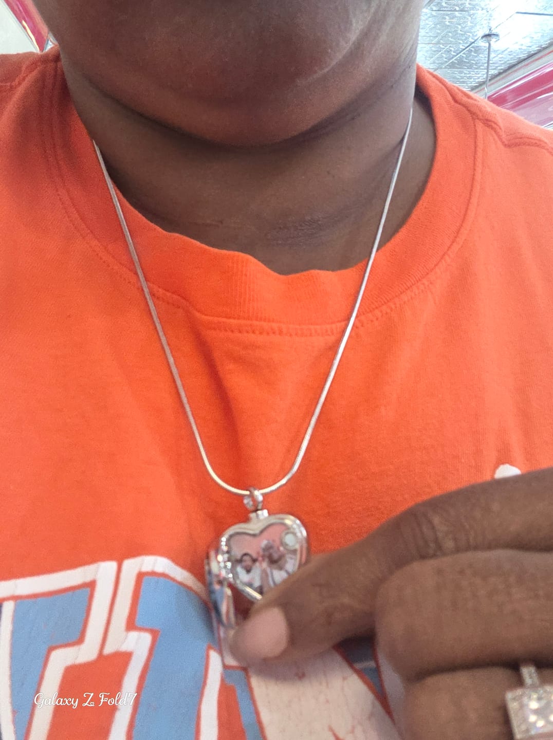 Customer photo review of Angel Urn Locket for Ashes