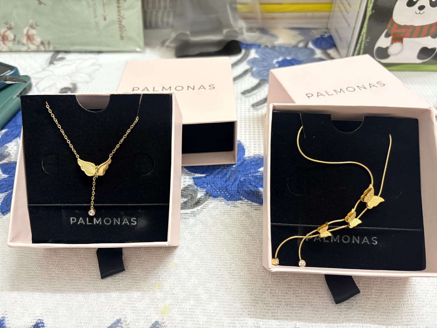 Customer photo review of Angel Wing Dangling Diamond Necklace