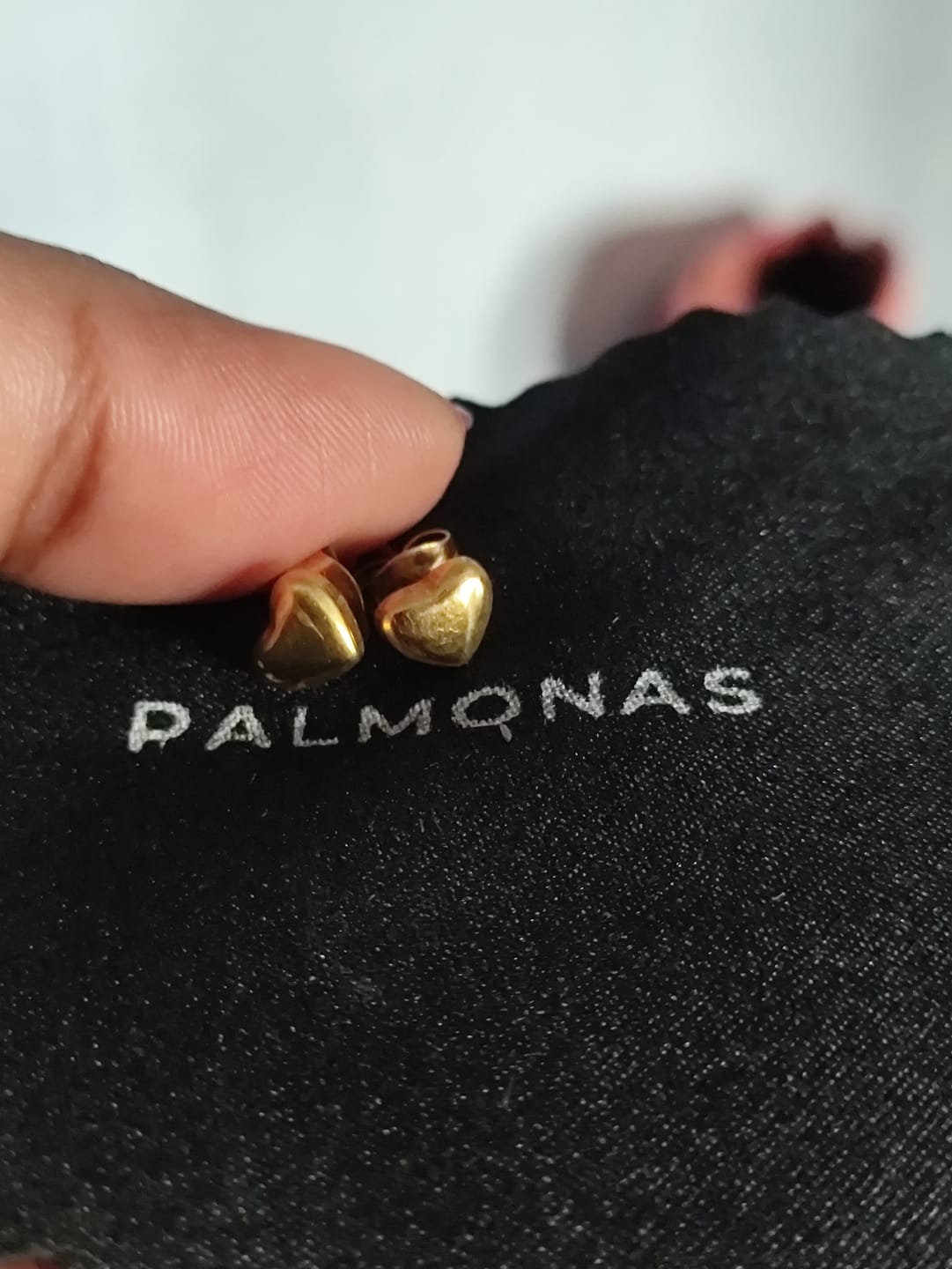 Customer photo review of Minimalist Heart Stud Earrings