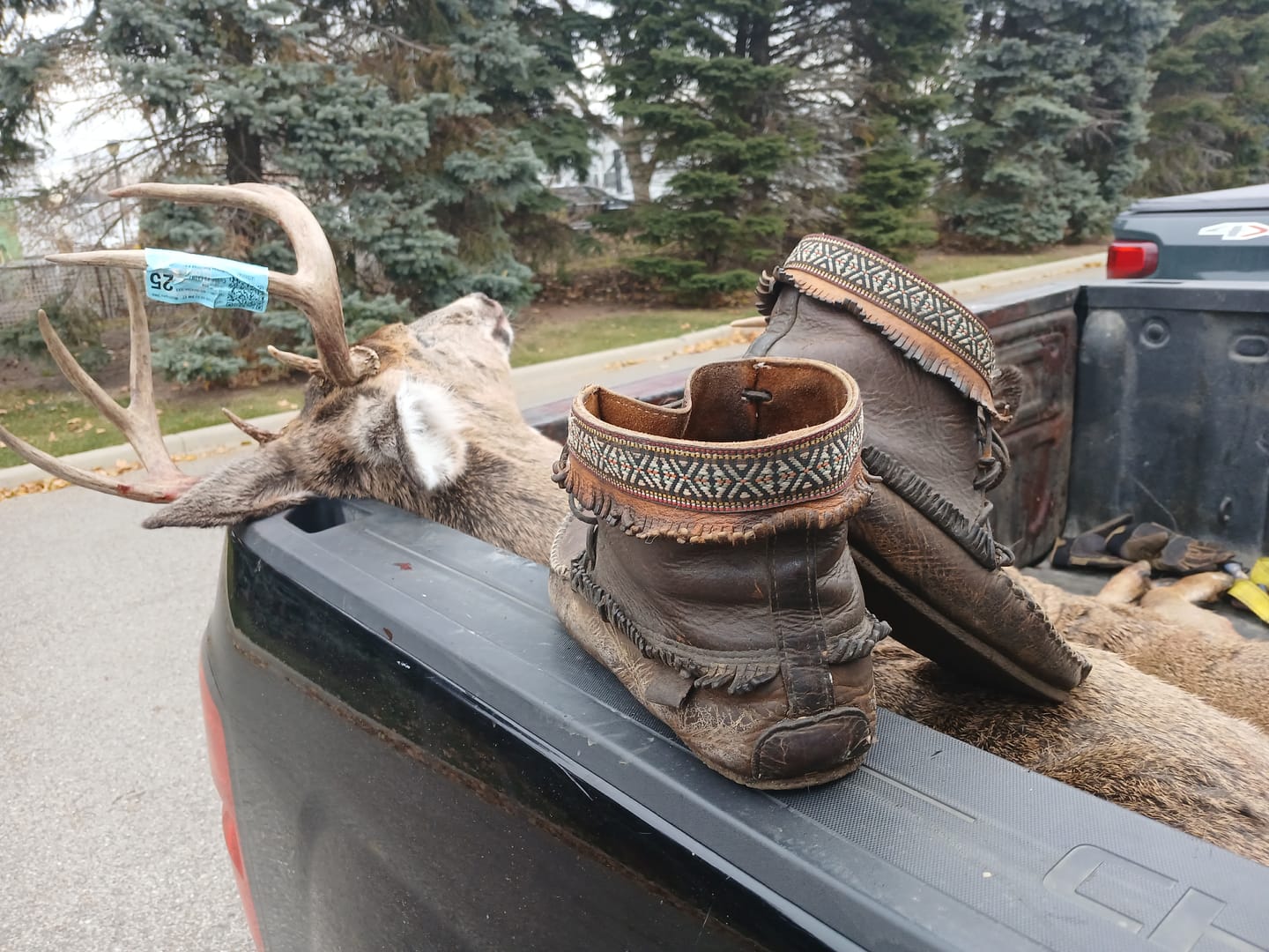 Customer photo review of Men's Moose Hide Leather Moccasin Boots