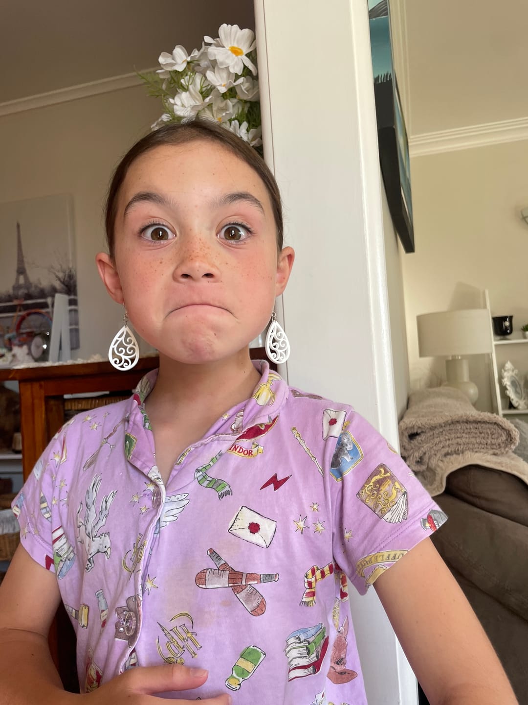 Customer photo review of Koru Swirl Earrings