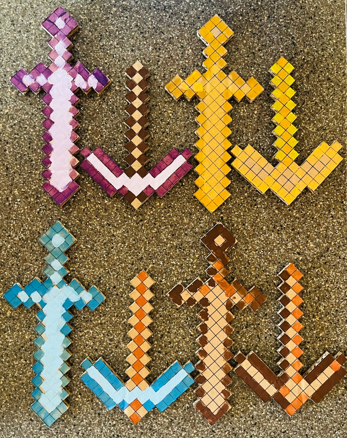 Customer photo review of DIY Minecraft Cardboard Swords and Axes for Kids – Birthday Party Craft, Recyclable Sword Decoration Activity